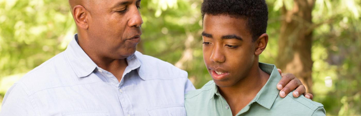 father talking to son