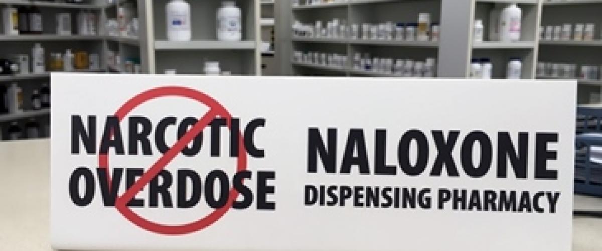 Sign that read Naloxone Dispensing Pharmacy