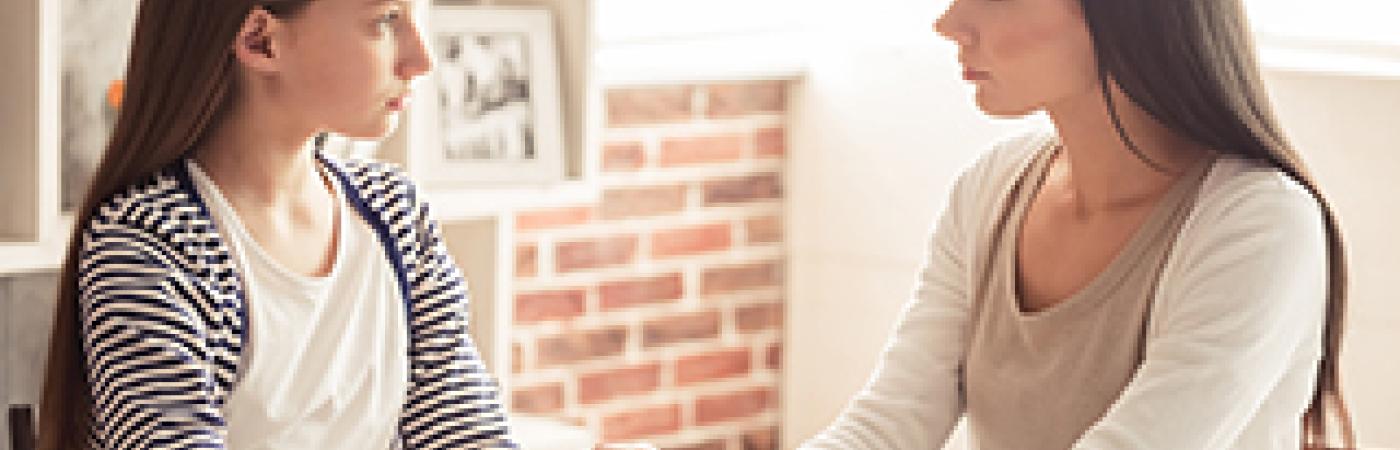 teen girl talking to parent