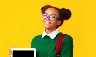 teen girl holding tablet